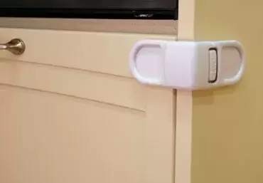 Retainer lock for drawers and furniture in caravans, motorhomes and campers.