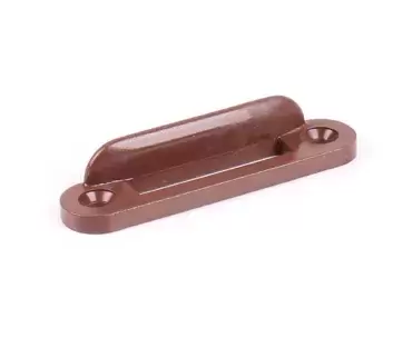 Brown plastic stopper for cabinet locks and caravan, motorhome and camper handles.